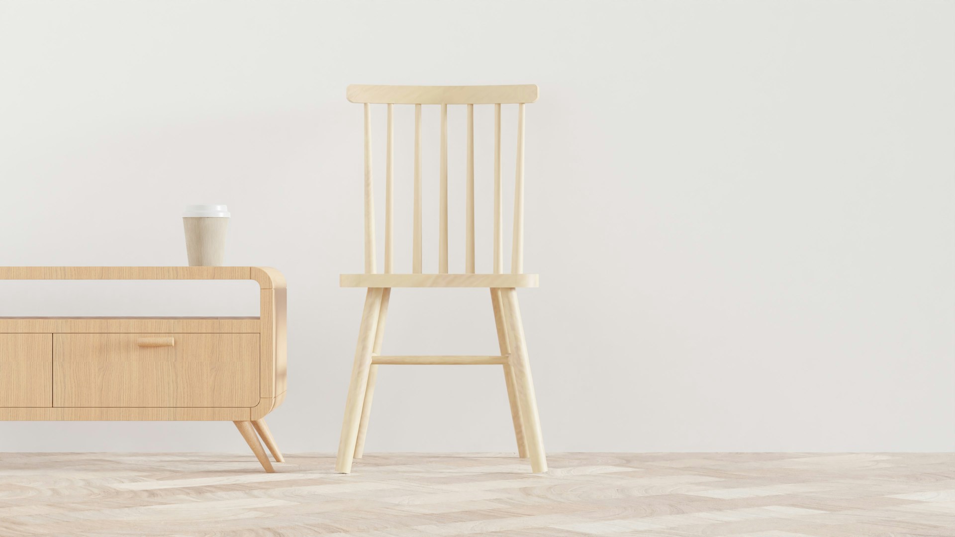 ものが少ないシンプルな部屋に木製の椅子とサイドボード
